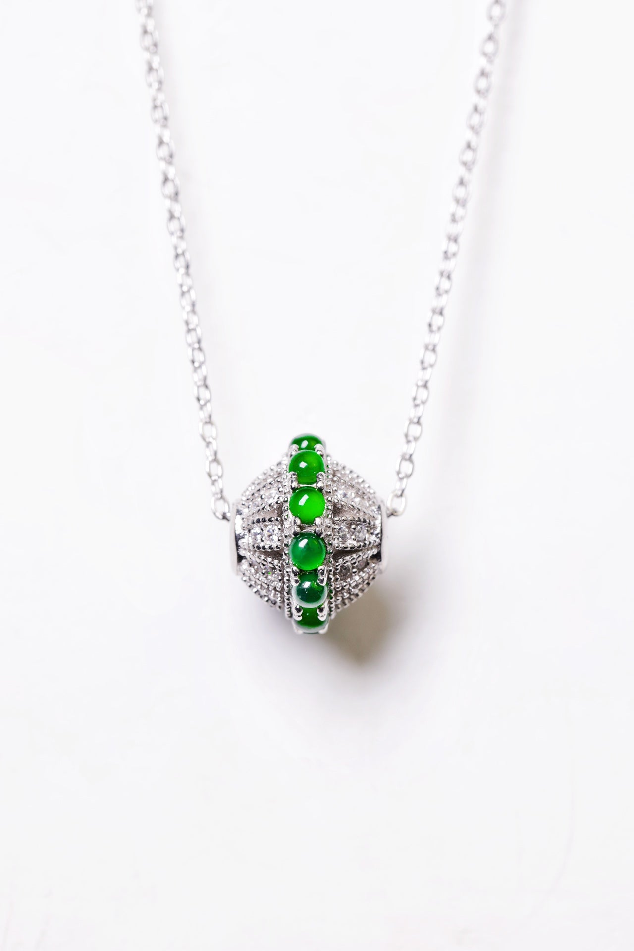 Rotating egg-shaped necklace S925 silver jade