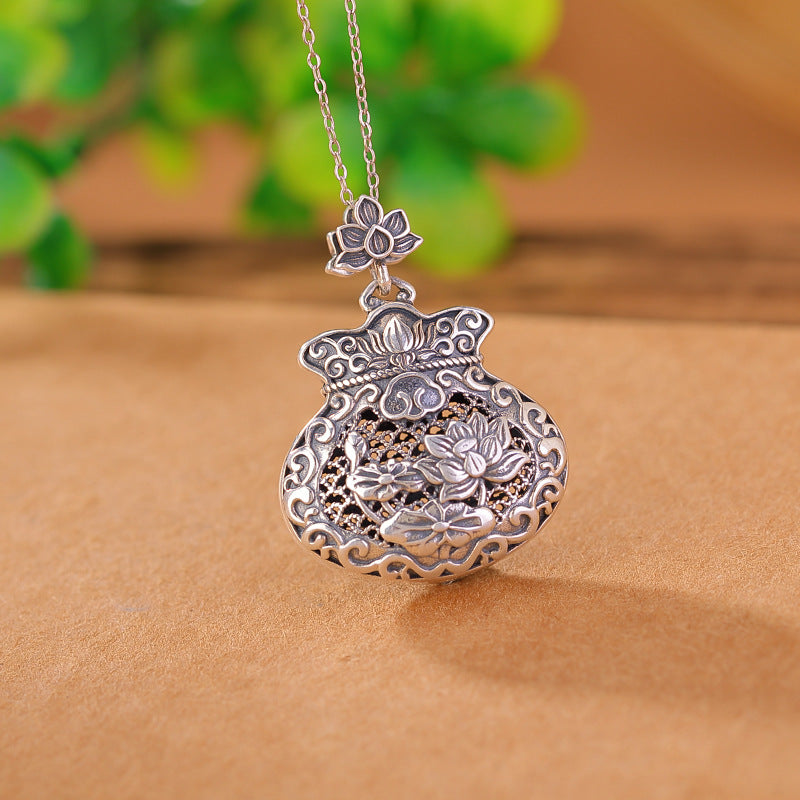 S990 sterling silver Nanhong retro national landscape Thai blue lotus leaf and lotus hollow blessing bag pendant | purse pendant